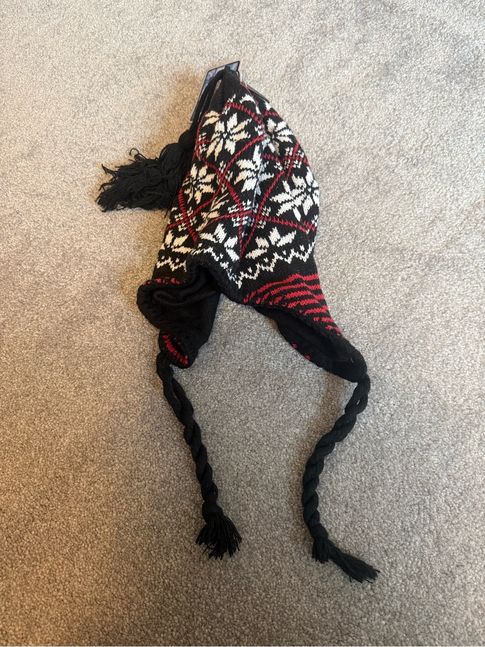 Kids Black, White & Red Knit Earflap Hat with Tassels snowflake and red detailin